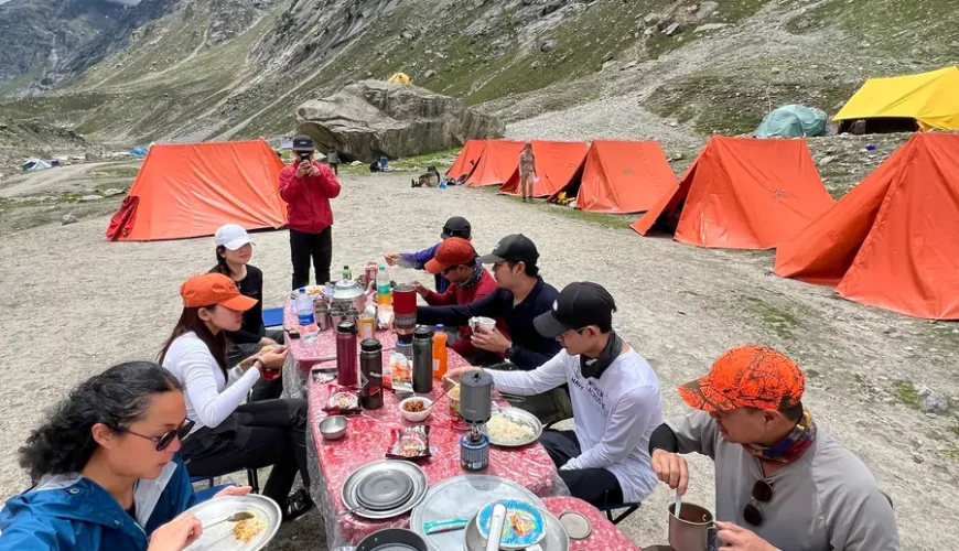 Hiking Essentials, Campers eating at campsite